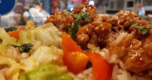 A close-up of a plate of sesame chicken at Bruno's Country Club in Nevada.