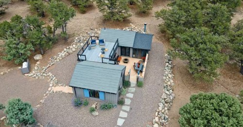 An aerial view of a Colorado Airbnb for stargazing with a large rooftop deck.