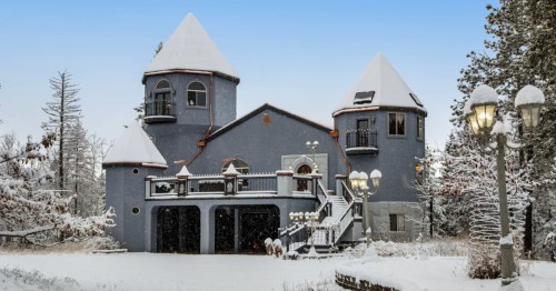 The exterior of a Montana Airbnb in the shape of a castle.