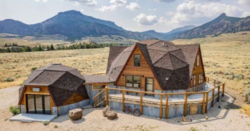 The exterior of a dome-shaped cabin Airbnb in Wyoming.