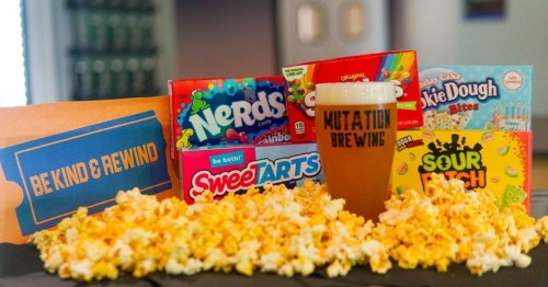 Candy and popcorn with a beer