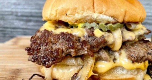 A close up of a burger from Willie's, one of the best burgers in Georgia.