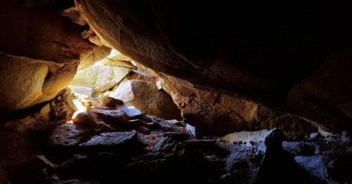 Views of the opening of an underground cave in New Mexico.