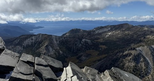 Incredible view from a high peak of Lake Tahoe and surrounding mountains from the Mount Rose Peak Trail in Incline Village, Nevada.