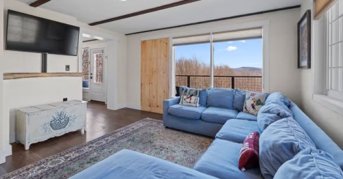 Modern rustic living room in New Hampshire Airbnb