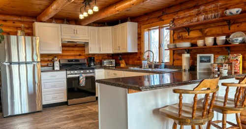 Wooden kitchen at Airbnb cabin in Vermont