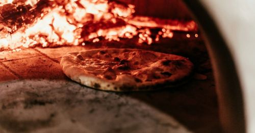 A pizza in the oven.