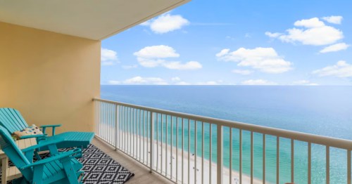 The oceanfront view from a condo vacation rental in Florida.