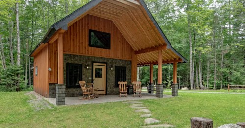 Craftsman Airbnb exterior in the woods in New Hampshire
