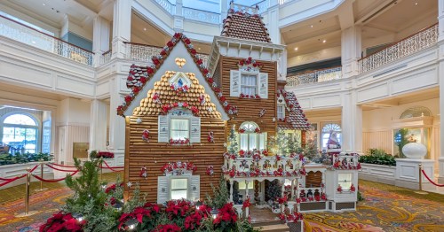 A brown gingerbread cottage in the lobby of The Grand Floridian hotel.