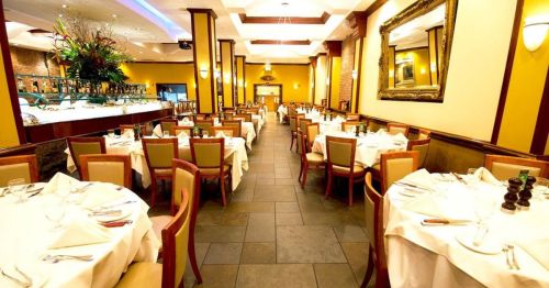 An interior shot of the dining space at Churrascaria Plataforma Steakhouse.