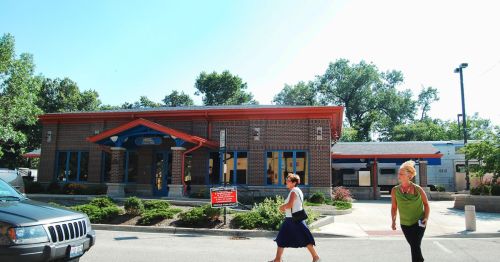 People leaving the Edison Park Metra station.