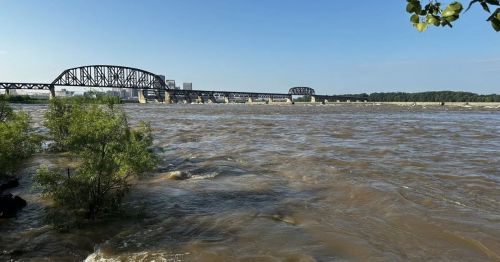 A large bridge over a wide river.