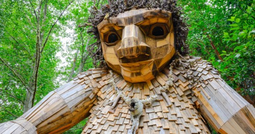 A close-up view of Pia the Peacekeeper, a giant troll created by artist Thomas Dambo