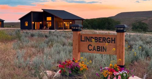 The exterior of the Lindbergh Cabin at Ever Sky Ranch in Shell, Wyoming.