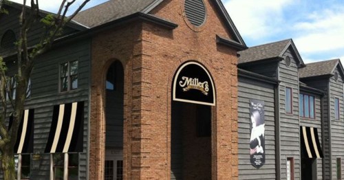 The exterior of a brick restaurant named "Miller's".