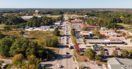 Aerial view of Zebulon, North Carolina, with a few streets, trees, and small buildings