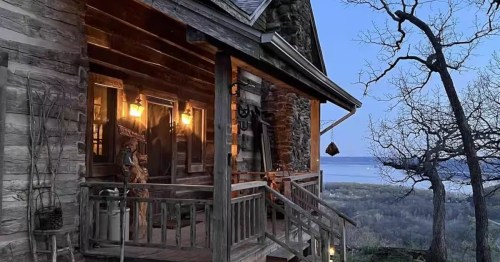 An upclose, exterior image of Eagle View, a rustic cabin bulit in the 1850s