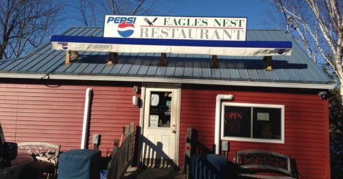 The exterior of Eagles Nest Restaurant, a small, red-colored restaurant in Brewer, Maine.
