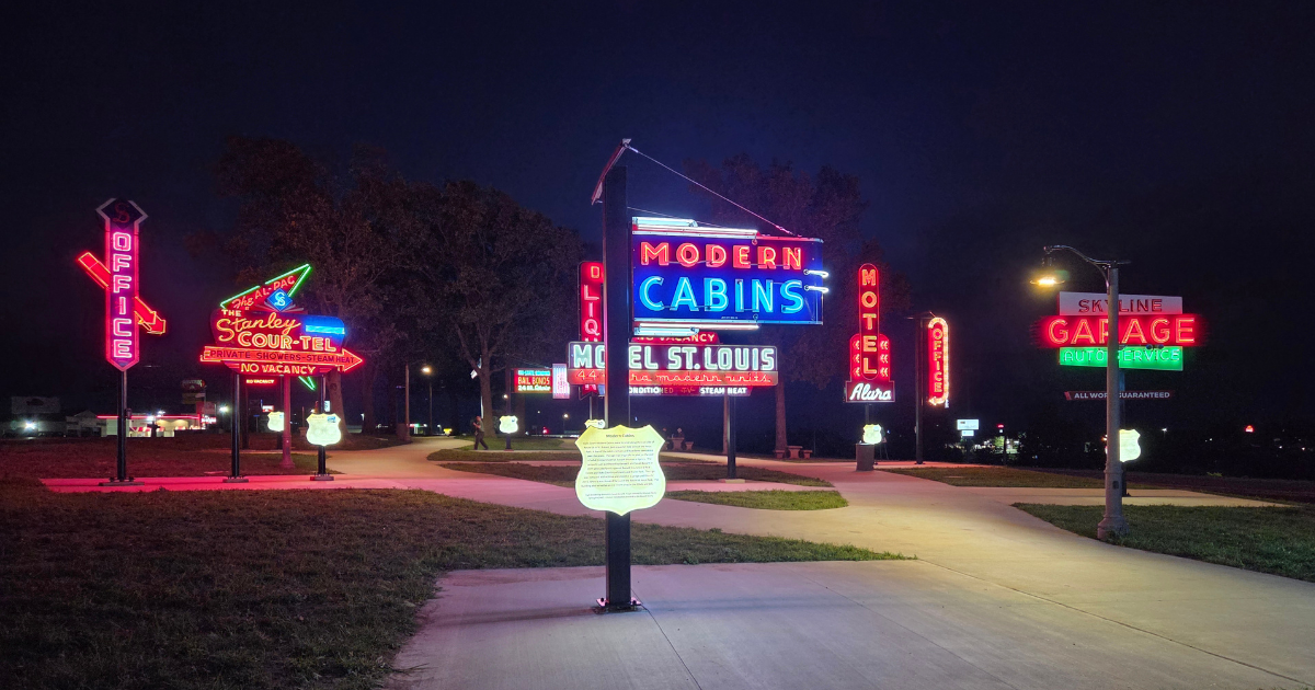 See Dozens of Restored Iconic Neon Signs Glow Again at Missouri’s New Route 66 Neon Park