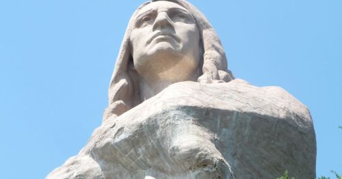 A close-up of the Eternal Indian Statue