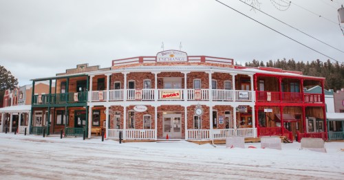 exterior of the burro street exchange building in downton cloudcroft new mexico surrounded by snow during winter