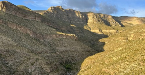 panoramic view of a canyon in the mountains of New Mexico on a sunny day
