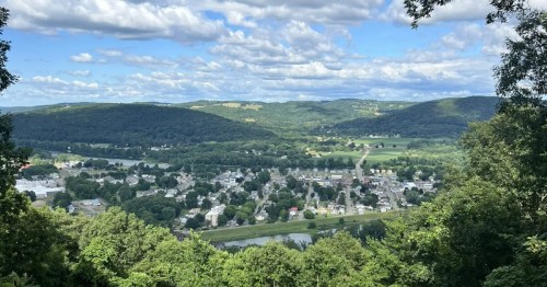 A viewpoint looking toward a town on a hiking trail in Pennsylvania.