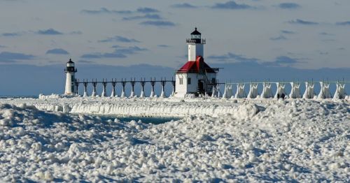 A lighthouse covered in snow.