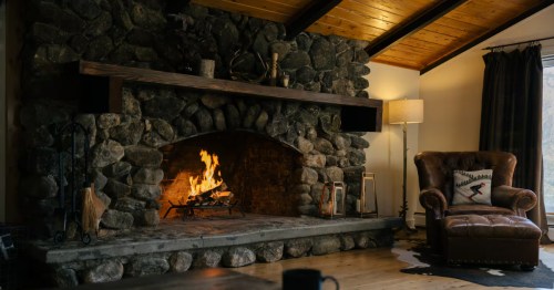 Stone fireplace in New Hampshire Airbnb chalet