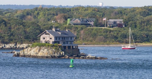 The historic Clingstone house perched on a rocky island in Narragansett Bay, Jamestown, Rhode Island.