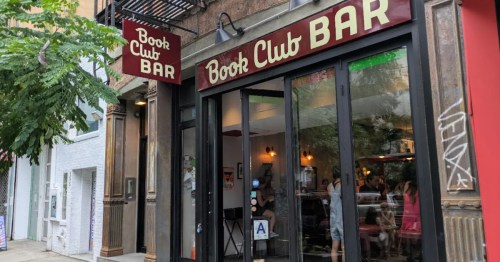 Exterior of Book Club Bar, a bookstore bar in NYC.