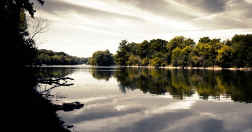 Fox River at the Hoover Forest Preserve under a cloudy sky in Illinois