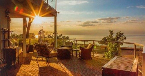 A unique Indiana Airbnb with a sun-drenched, waterfront terrace that looks like it belongs in Santorini