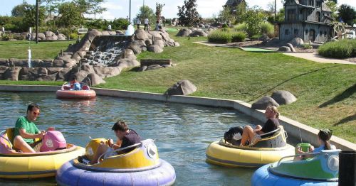 A family riding bumper boats in Michigan