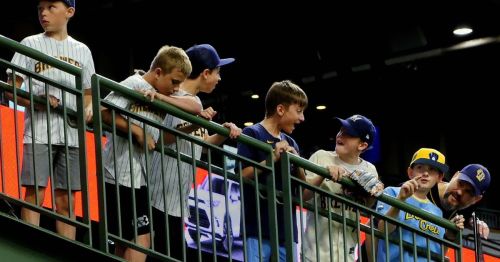 Children at a professional baseball game in Wisconsin.