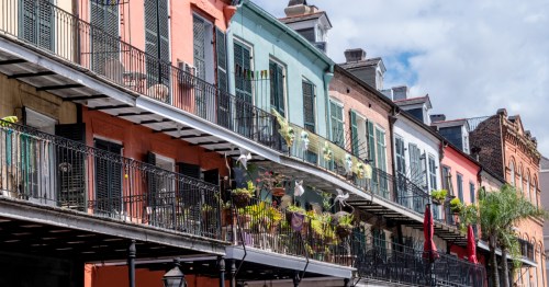 exterior of colorful row homes in new orleans' french quarter