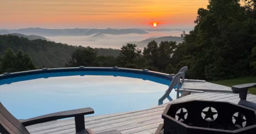 The sun rises over the Daniel Boone National Forest, seen from a cabin in Kentucky.