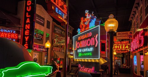 A dazzling streetscape of retro neon lights. Capturing the bright, colorful Ohio night aesthetic.