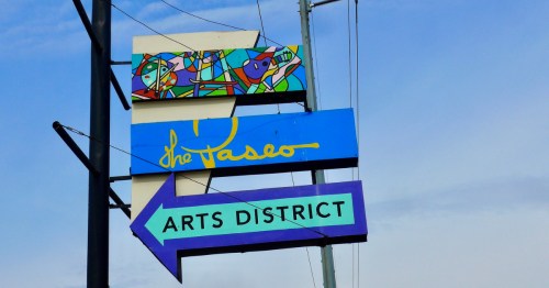 colorful blue signage for the paseo arts district in okc