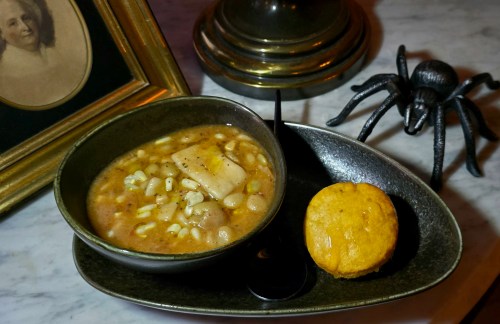 Soup dish served with a side biscut