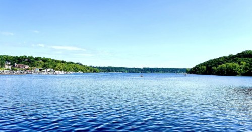 Bright blue river between the shores along the St. Croix Crossing trail