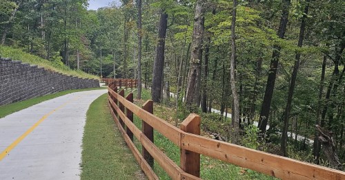 view of the paved, winding WOKA Trail between oklahoma and Arkansas