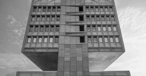 The brutalist Pirelli Building (Hotel Marcel) in New Haven, Connecticut, showing its unique cantilevered design.