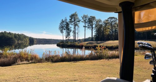View of golf course and lake at a state park in Cheraw, SC