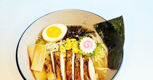Savory Chicken Ramen with tender chashu, soft-boiled egg, and fresh scallions in a rich, clear broth.