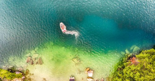 Aerial view of the stunning turquoise water over Lake Jocassee SC