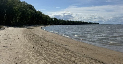 Scenic view of the historic Lakeside Chautauqua community along the rocky Marblehead shoreline.