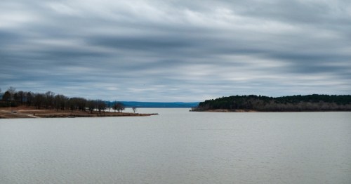 clouds hover over lake wister in wister oklahoma