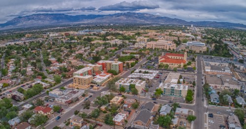 An aerial view of downtown Albuquerque, New Mexico, on an overcast day.